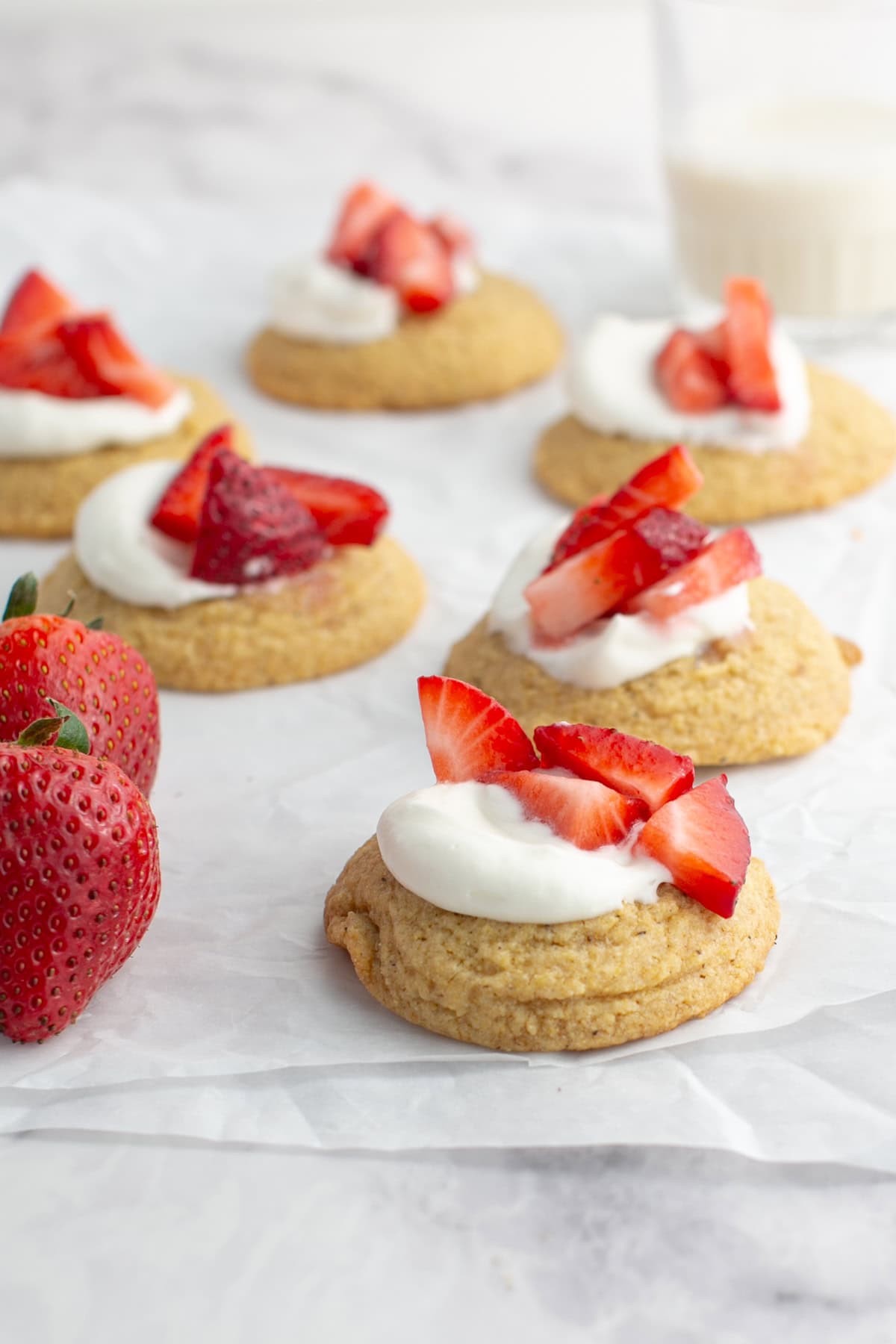 Strawberry Shortcake Cornbread Cookie on parchment paper.