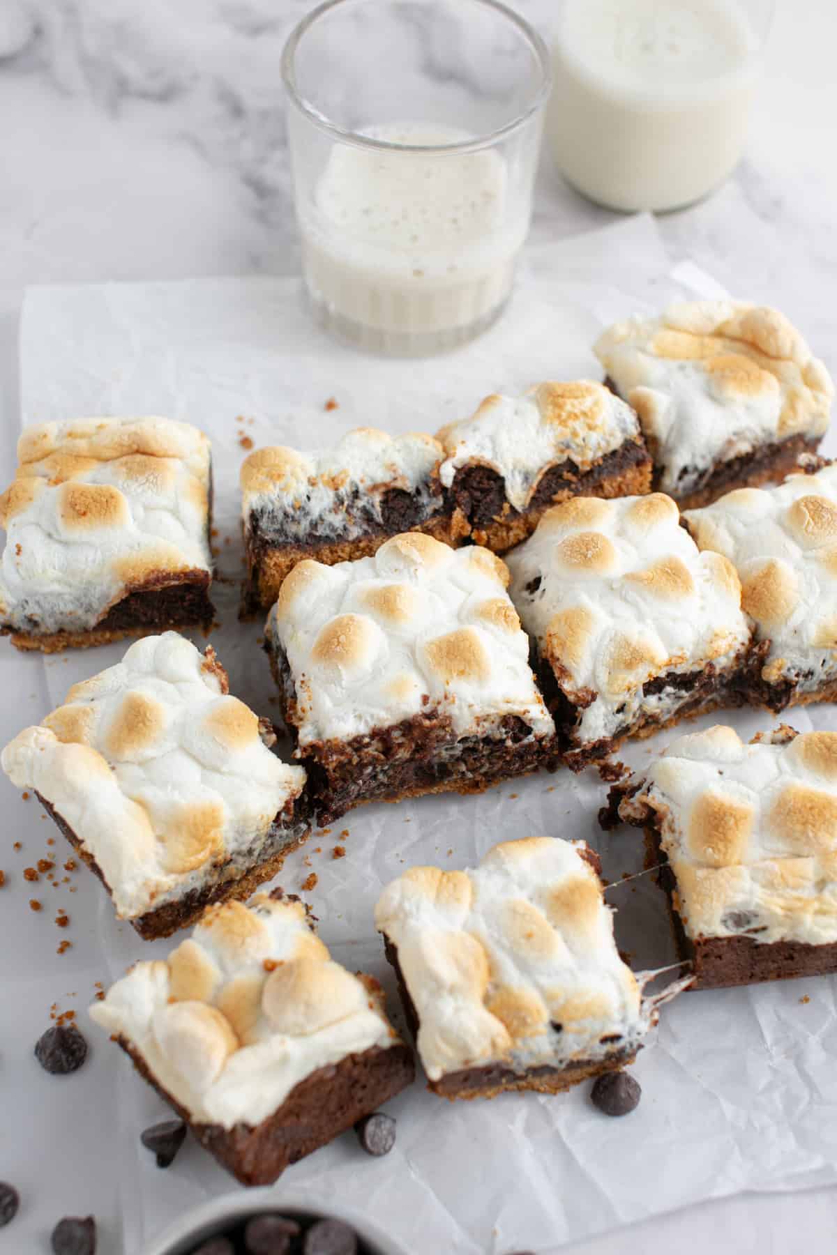 S’mores Brownie Recipe cut on parchment paper.