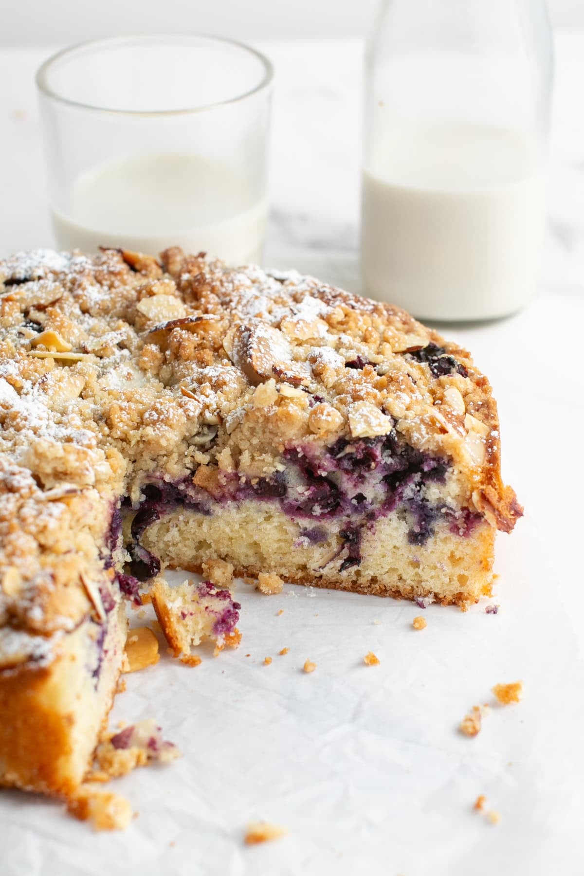 Blueberry Almond Crumble Cake cut into slices.