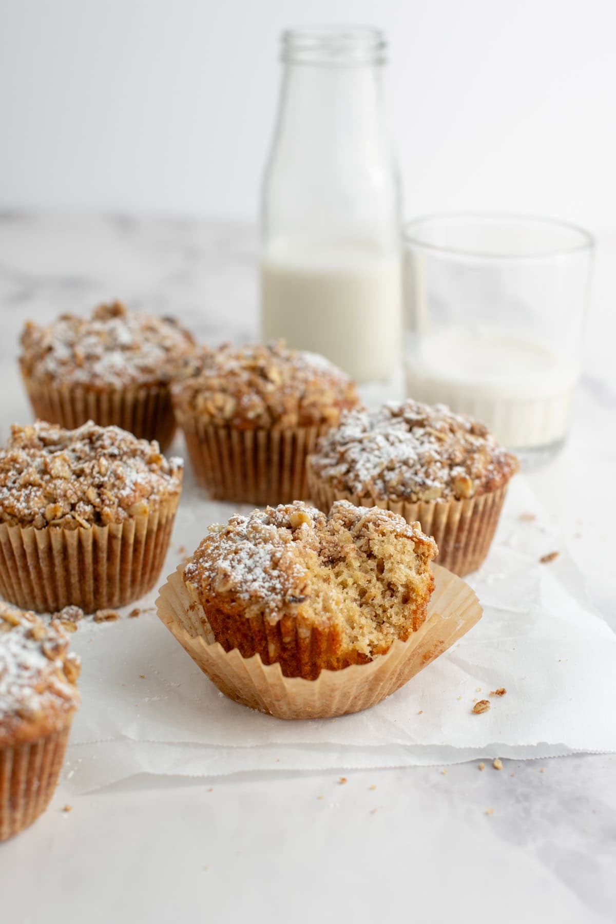 Cinnamon Oatmeal Muffin with a bite missing.