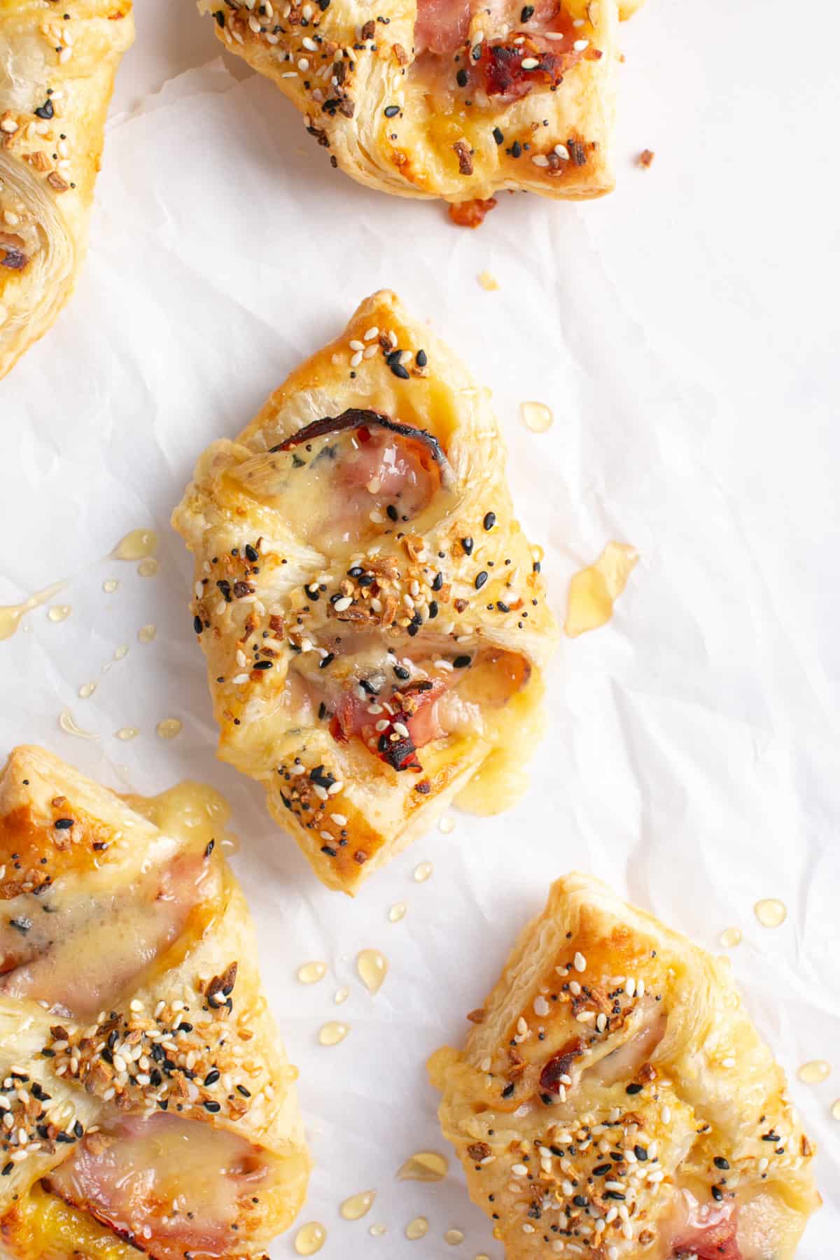Ham and Cheese Breakfast Pastry with a drizzle of honey.