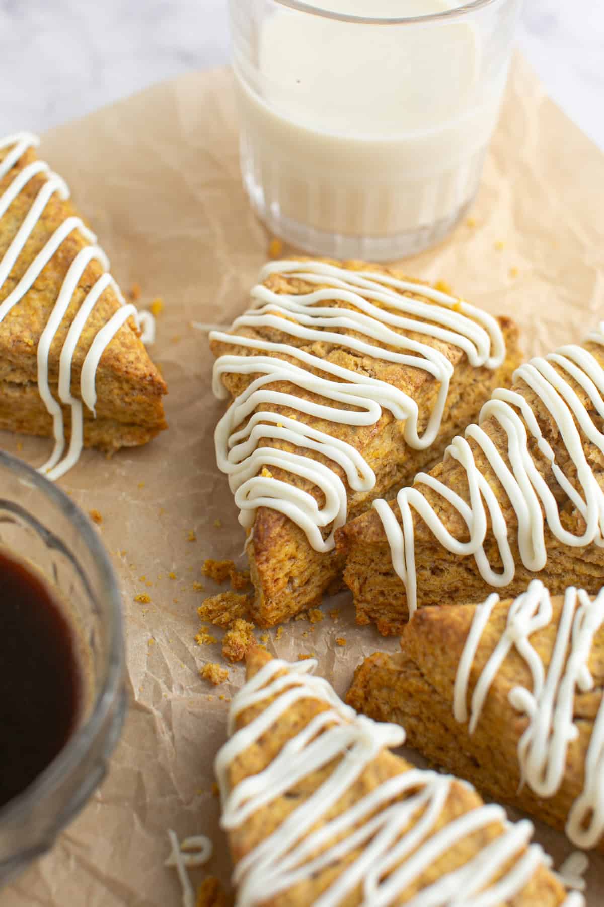 Pumpkin Scones by a glass of milk.