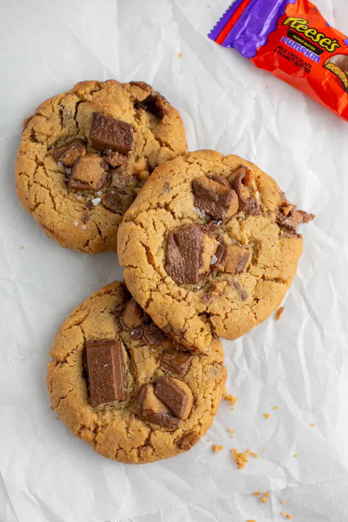 Single Serve Peanut Butter Candy Cookies stacked on each other.