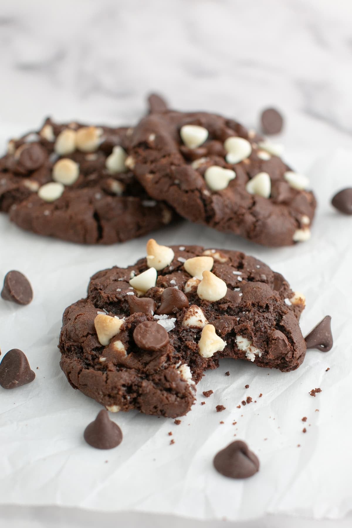 Triple Chocolate Chunk Cookie with some crumbs.