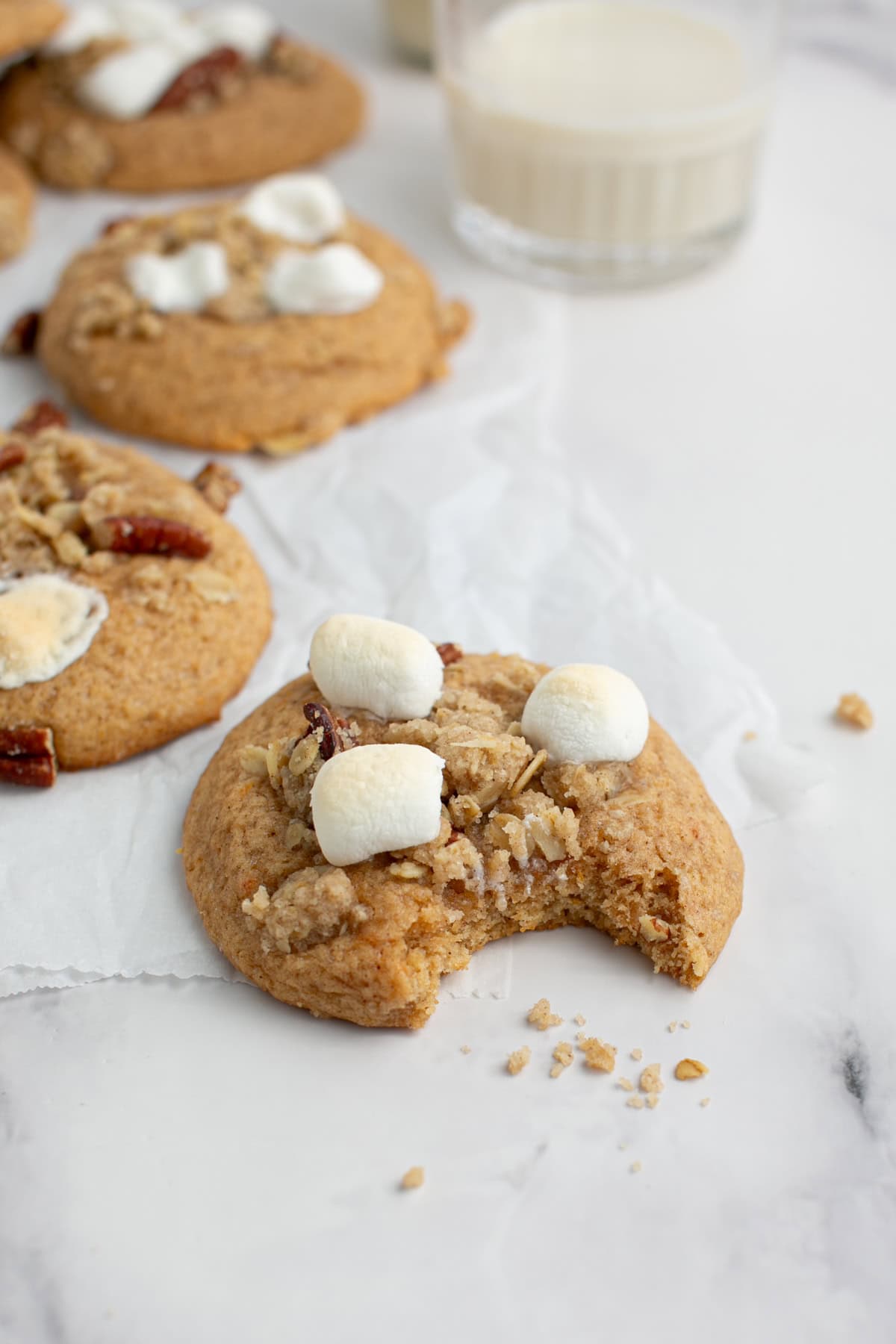 Sweet Potato Casserole Cookies with a bite missing.
