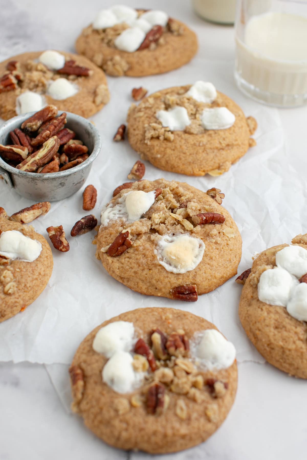Sweet Potato Casserole Cookies by a glass of milk.
