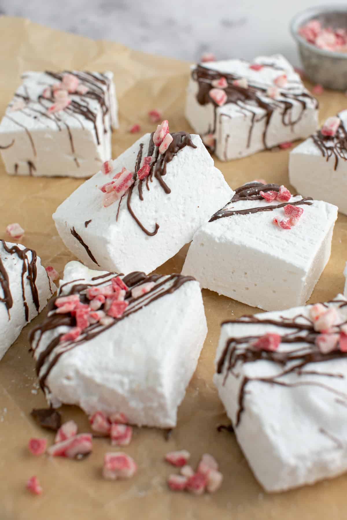 Homemade Vanilla Bean Marshmallow stacked with chocolate.