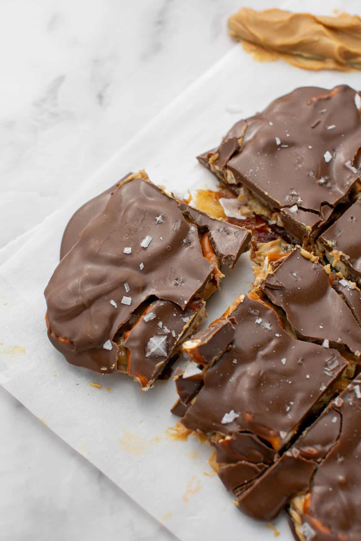 Chocolate Peanut Butter Pretzel Date Bark with pretzels.